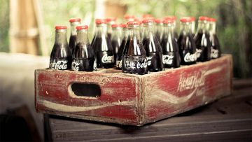 Foto vintage de un cajón vintage de botellas vintage de Coca-Cola.